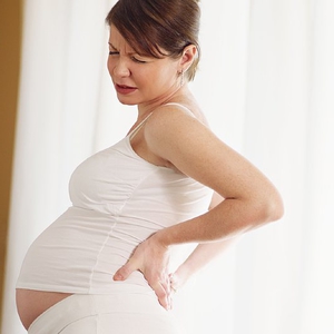 Причины болей в области поясницы у беременной