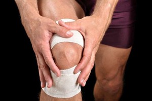 Причины боли в колене